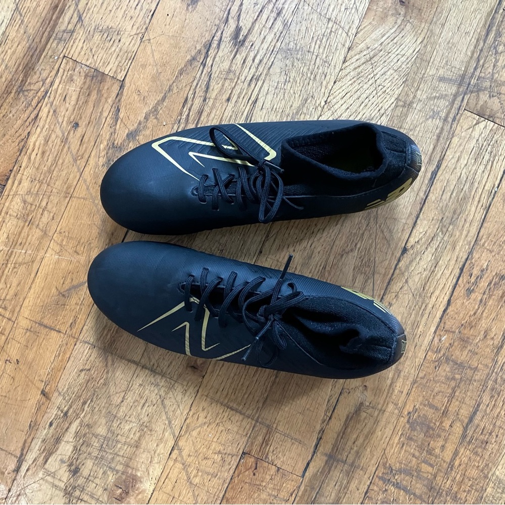 New Balance Black and Gold Tekela Soccer Cleats